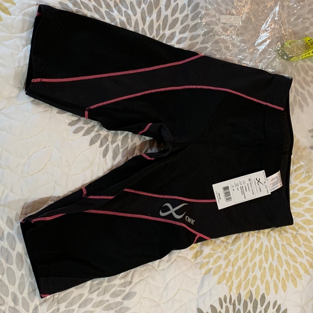 CWX pro shorts back/soft pink size: XS womens brand new